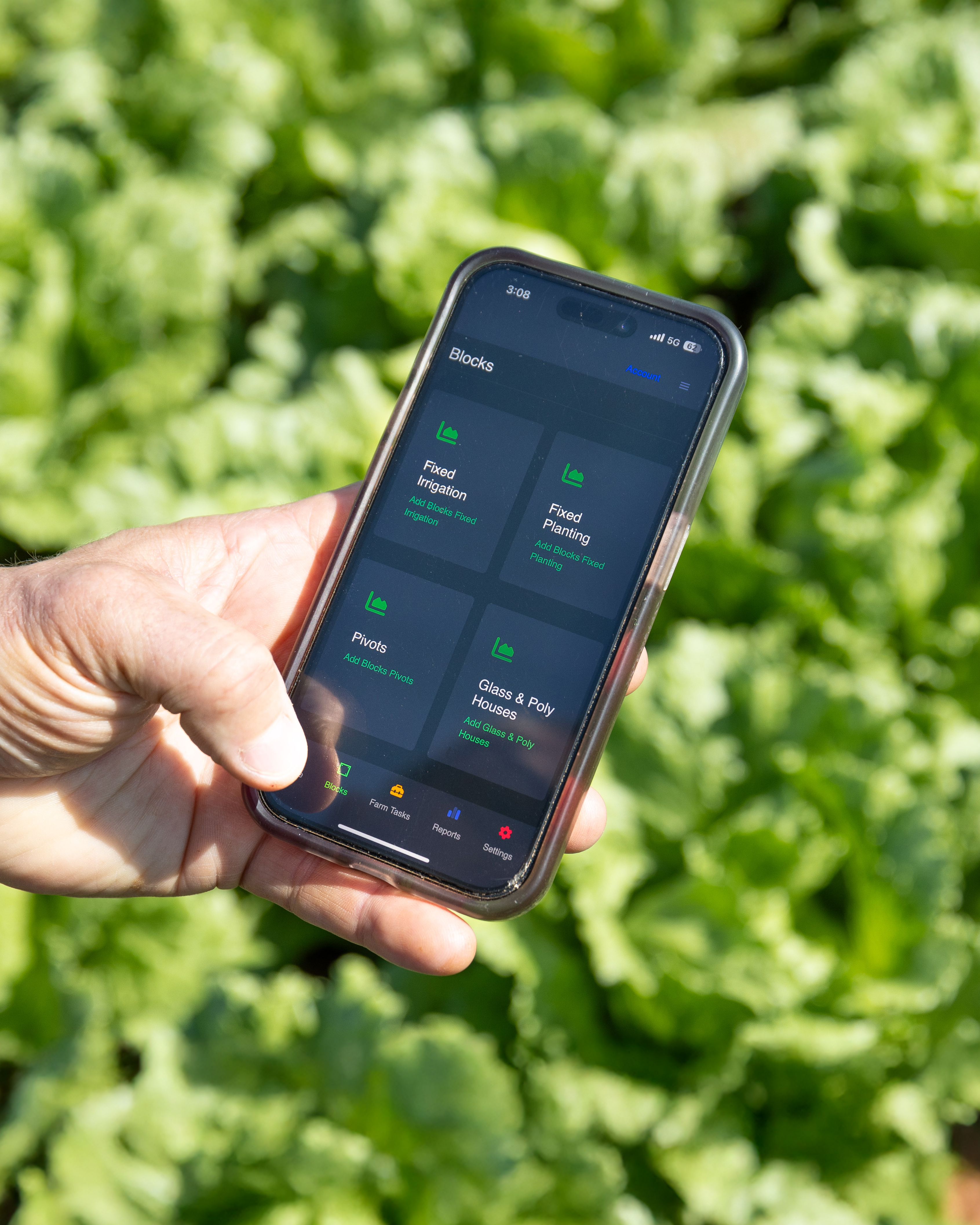 Click2Gro dashboard shown on an iPad in a farm setting